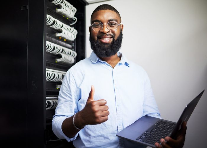 server-room-laptop-and-thumbs-up-with-technician-2025-04-06-10-37-04-utc